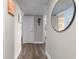 Inviting hallway with wood floors and neutral tones leads to various rooms, adding warmth to the interior at 202 74Th Ave. N # 2547/2548, Myrtle Beach, SC 29572