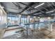 Bright indoor pool area with access to an outdoor patio, featuring a hot tub, chairs, and ocean views at 202 74Th Ave. N # 2547/2548, Myrtle Beach, SC 29572