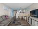 Open-concept living room, dining area, and kitchen provide a comfortable space for relaxation and entertaining at 202 74Th Ave. N # 2547/2548, Myrtle Beach, SC 29572