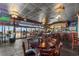 Beachfront Kitchen and Bar interior with lots of tables and bar seating, with ocean views and a relaxed atmosphere at 202 74Th Ave. N # 2547/2548, Myrtle Beach, SC 29572