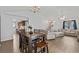 Dining area showcasing an open layout connecting to the living room, perfect for gatherings and everyday living at 202 Millstone Dr., Myrtle Beach, SC 29588