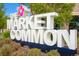 The Market Common sign surrounded by colorful foliage near local businesses at 202 Millstone Dr., Myrtle Beach, SC 29588
