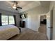 Comfortable bedroom featuring neutral walls, carpet, natural light, and a ceiling fan at 206 N Levee Dr., Georgetown, SC 29440