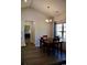 Inviting dining room featuring stylish table set, chandelier, and a view of the backyard at 206 N Levee Dr., Georgetown, SC 29440
