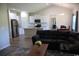 Open-concept living room showcasing a modern kitchen, comfortable seating, and an inviting dining area at 206 N Levee Dr., Georgetown, SC 29440