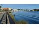 Scenic waterfront view with boats and a wooden boardwalk at 206 N Levee Dr., Georgetown, SC 29440