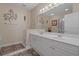 Bright bathroom featuring a double vanity, decorative mirrors, and tiled flooring at 2241 Waterview Dr. # 537, North Myrtle Beach, SC 29582