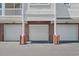 Townhome garages with brick facade and ample parking space for residents at 2241 Waterview Dr. # 537, North Myrtle Beach, SC 29582
