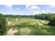 Aerial view of a lush golf course showcasing greens, sand traps, and manicured fairways at 2241 Waterview Dr. # 537, North Myrtle Beach, SC 29582