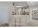 Charming kitchenette with breakfast bar, modern appliances, and a view of the bathroom at 2241 Waterview Dr. # 537, North Myrtle Beach, SC 29582