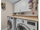 Laundry room equipped with modern appliances and ample counter space for folding at 2241 Waterview Dr. # 537, North Myrtle Beach, SC 29582