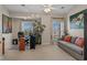 A home office offering a dedicated workspace, natural light, and comfortable seating at 2241 Waterview Dr. # 537, North Myrtle Beach, SC 29582