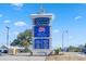 Sign for Barefoot Landing with list of restaurants and businesses, and parking lot at 2241 Waterview Dr. # 537, North Myrtle Beach, SC 29582