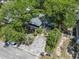 A high angle shot of the property with a spacious parking area and a screened-in porch at 2425 Park St., North Myrtle Beach, SC 29582