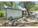 A wooden shed with a door and a backyard deck at 2425 Park St., North Myrtle Beach, SC 29582