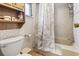 Bathroom featuring shower over tub and built in shelving at 2425 Park St., North Myrtle Beach, SC 29582