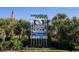 Welcome to North Myrtle Beach, South Carolina sign surrounded by palm trees at 2425 Park St., North Myrtle Beach, SC 29582