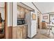 Efficient kitchen space with wood cabinets, modern appliances, and convenient access to dining area at 2425 Park St., North Myrtle Beach, SC 29582