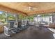 Spacious sunroom with ample rocking chairs and a table set for relaxation and conversation at 2425 Park St., North Myrtle Beach, SC 29582