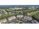 Aerial view of condo community situated in a golf course with beautiful trees and landscaping at 260 Woodlands Way # 2, Calabash, NC 28467