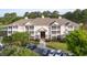 Attractive multi-Gathering home boasts well-maintained landscaping, private balconies, and convenient parking at 260 Woodlands Way # 2, Calabash, NC 28467
