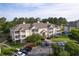 Well-kept multi-Gathering home with golf course view, private balconies, landscaped yard, and convenient parking at 260 Woodlands Way # 2, Calabash, NC 28467