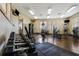 Interior view of the gym featuring weights, benches, machines, and multiple ceiling lights at 260 Woodlands Way # 2, Calabash, NC 28467