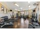 Interior view of the gym featuring weights, benches, machines, and multiple ceiling lights at 260 Woodlands Way # 2, Calabash, NC 28467