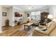 Open concept living room features hard surface floors and plenty of natural light at 260 Woodlands Way # 2, Calabash, NC 28467
