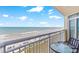 Balcony view overlooking the beautiful, sunny beach and clear ocean waters at 2701 S Ocean Blvd. # 902, North Myrtle Beach, SC 29582