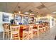 Charming bar area featuring a well-stocked counter, comfortable seating, and multiple screens at 2701 S Ocean Blvd. # 902, North Myrtle Beach, SC 29582