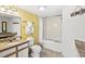 Bathroom featuring a jacuzzi tub and a granite-topped vanity at 2701 S Ocean Blvd. # 902, North Myrtle Beach, SC 29582