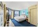 Bedroom with balcony access, ocean views, and a coastal aesthetic at 2701 S Ocean Blvd. # 902, North Myrtle Beach, SC 29582