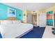 Bedroom with queen bed with an ensuite bathroom and kitchenette at 2701 S Ocean Blvd. # 902, North Myrtle Beach, SC 29582