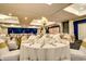 Elegant event space with beautifully set tables and soft lighting, perfect for weddings and celebrations at 2701 S Ocean Blvd. # 902, North Myrtle Beach, SC 29582