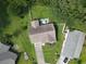 Aerial shot of a home featuring a backyard patio with umbrella and a well maintained lawn surrounded by fencing at 271 Sienna Dr., Little River, SC 29566