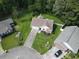 Overhead view of a cozy home with a neat lawn, concrete driveway, and well-kept landscaping in a cul-de-sac at 271 Sienna Dr., Little River, SC 29566