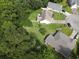 Overhead view of home with a well-maintained lawn near lush trees and other single Gathering homes in the area at 271 Sienna Dr., Little River, SC 29566