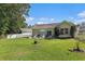 Home with a beautiful and spacious backyard for relaxing and recreation at 271 Sienna Dr., Little River, SC 29566