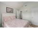 Light-filled bedroom features a calming color palette and ensuite bath at 271 Sienna Dr., Little River, SC 29566