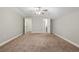 Spacious bedroom with neutral walls, ceiling fan, and carpet at 2712 Austin Ave., Conway, SC 29527