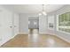 Open dining area with neutral paint, large windows, and tile flooring at 2712 Austin Ave., Conway, SC 29527