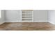 Detail shot of the living room showing the wood floors and built-in shelving at 2712 Austin Ave., Conway, SC 29527