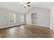 Bright living room featuring a vaulted ceiling, a ceiling fan, and wood floors at 2712 Austin Ave., Conway, SC 29527