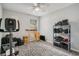 Neutral room with exercise equipment, storage, and a light-colored ceiling fan at 2768 Temperance Dr., Myrtle Beach, SC 29577