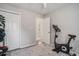 Neutral bedroom showcasing closet space and doorway, with exercise equipment at 2768 Temperance Dr., Myrtle Beach, SC 29577