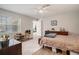 Generously sized bedroom with a ceiling fan, neutral color scheme, wood flooring, and natural light at 2768 Temperance Dr., Myrtle Beach, SC 29577