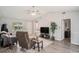 Inviting living room features vaulted ceiling, cozy seating, and a large window for plenty of natural light at 2768 Temperance Dr., Myrtle Beach, SC 29577