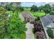 Beautiful brick home with a well-manicured lawn and a view of the golf course at 290 Dornoch Dr., Pawleys Island, SC 29585