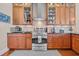 Well-equipped kitchen with stainless steel appliances, granite countertops, and ample cabinet storage at 290 Dornoch Dr., Pawleys Island, SC 29585
